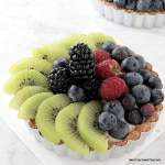 These Fresh Fruit Tarts are filled with coconut milk pastry cream and have a coconut-almond crust | Low carb, Gluten-free & Casein-free | lowcarbmaven.com