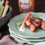 Chicken marinated in Buffalo sauce, wrapped in bacon and baked until crispy. | low carb, keto, gluten-free